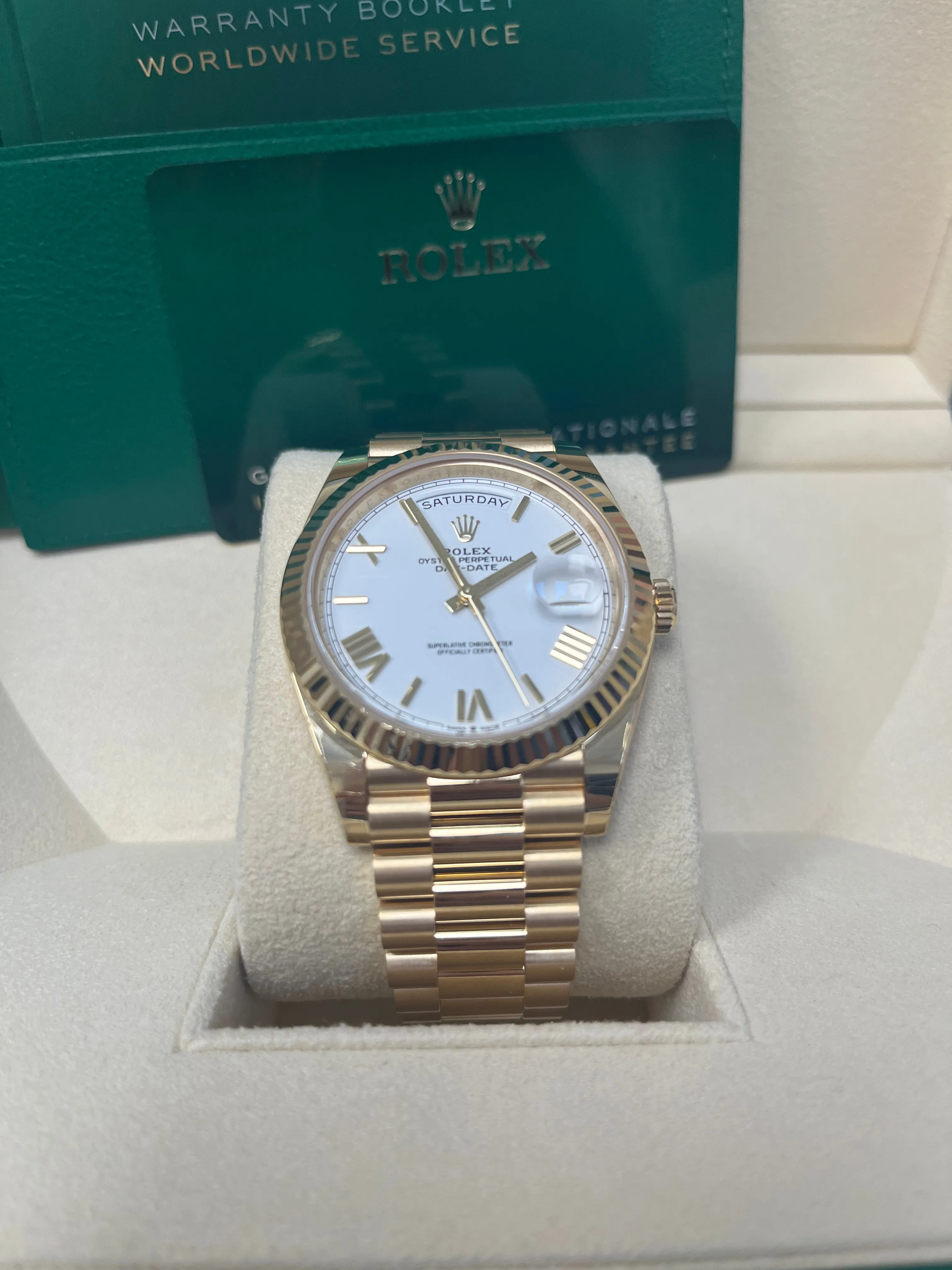 Rolex Day-Date 40 Yellow Gold White Roman Dial Fluted Bezel (Ref# 228238)