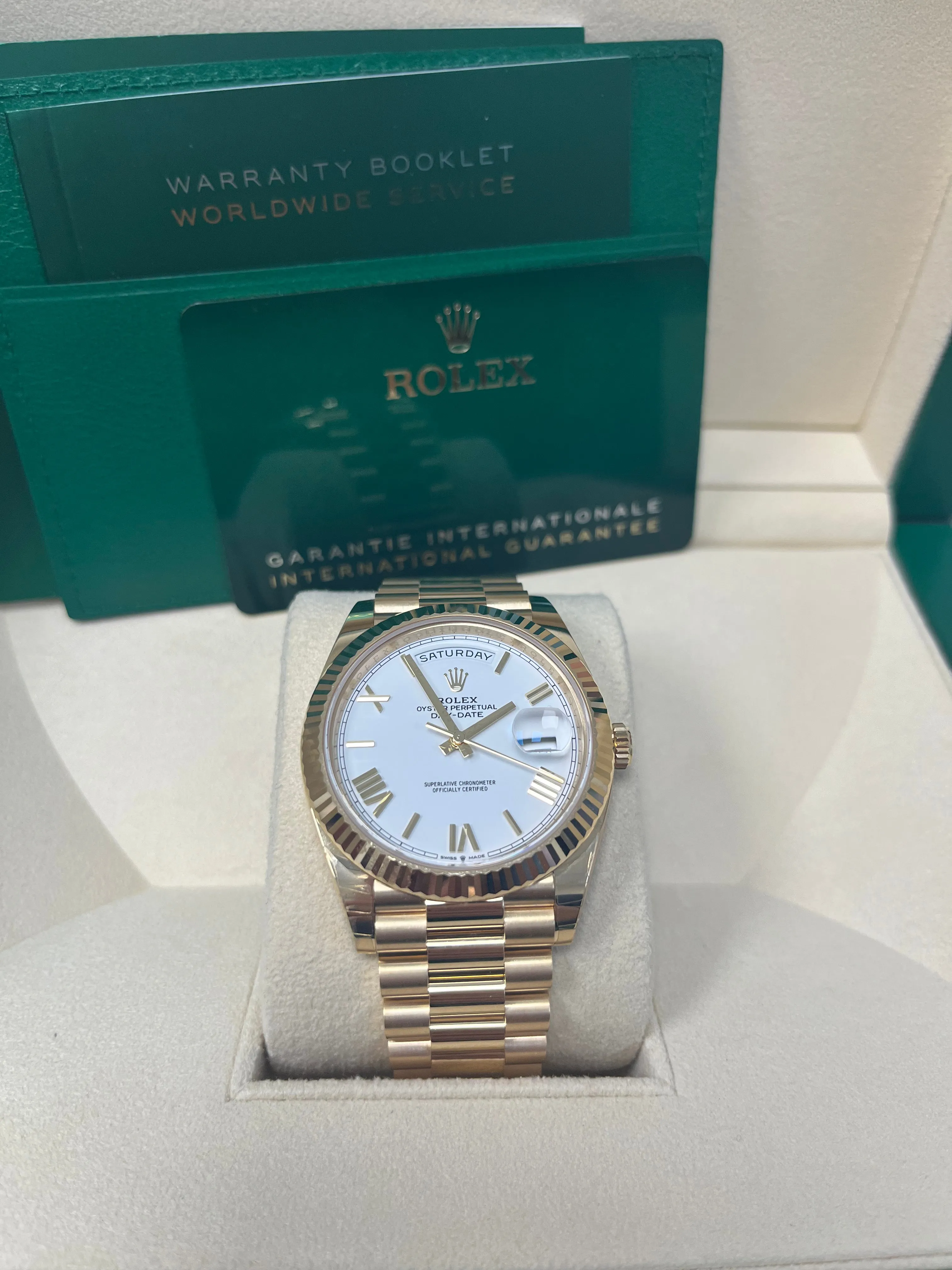 Rolex Day-Date 40 Yellow Gold White Roman Dial Fluted Bezel (Ref# 228238)