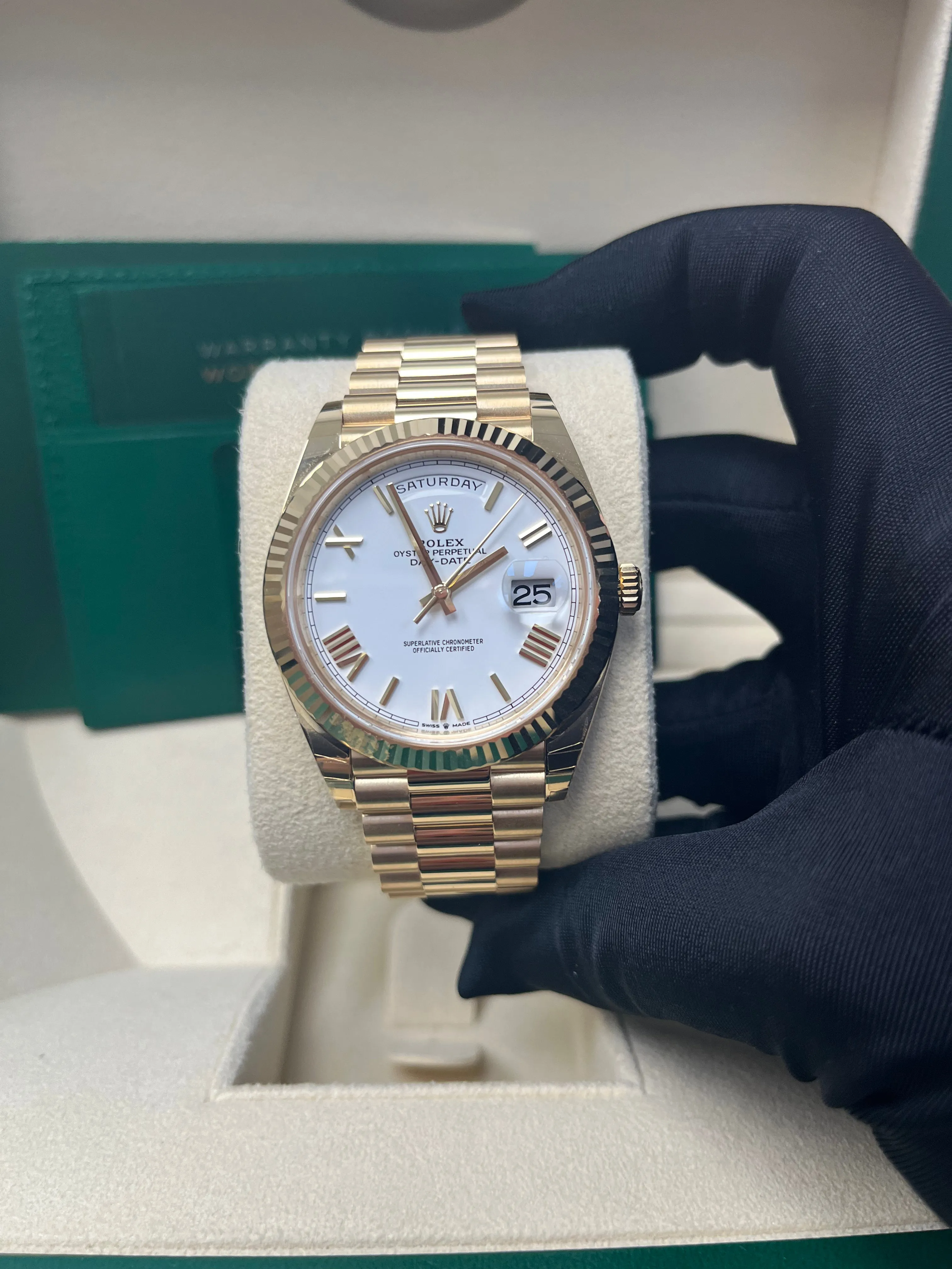 Rolex Day-Date 40 Yellow Gold White Roman Dial Fluted Bezel (Ref# 228238)